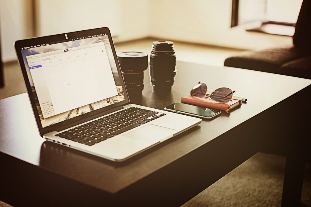 Laptop And Mobile On Elegant Table - Web24hub laptop on table